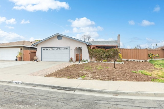 ranch-style home with a garage