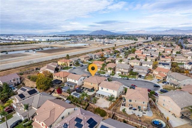 bird's eye view with a mountain view and a residential view