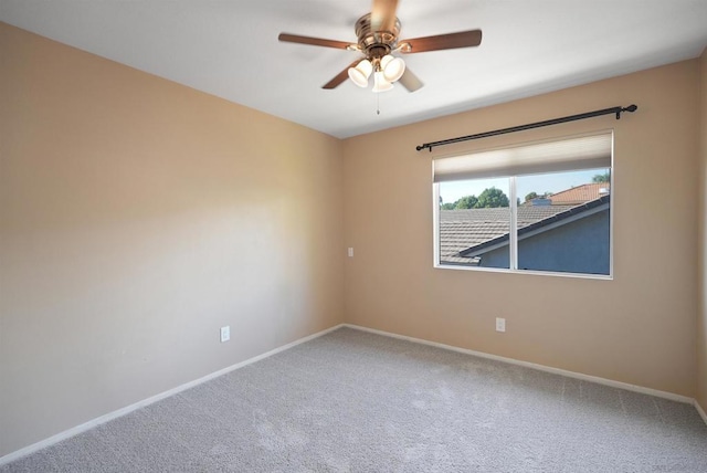 unfurnished room featuring carpet and ceiling fan