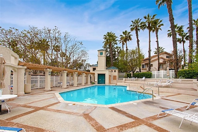 view of swimming pool with a patio