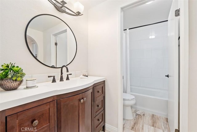 full bathroom with vanity, toilet, and shower / bath combination with curtain