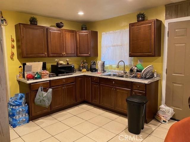 523 Fairlawn, Santa Ana, CA 92703 - kitchen featuring a sink, light countertops, stainless steel microwave, and recessed lighting