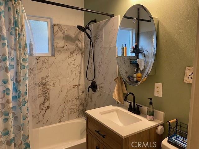 bathroom featuring shower / bathtub combination with curtain and vanity