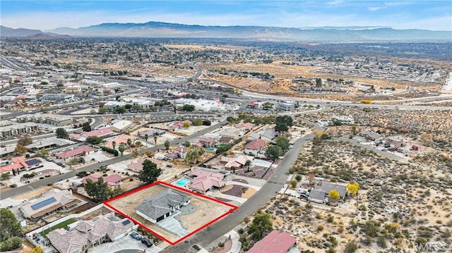 drone / aerial view featuring a mountain view