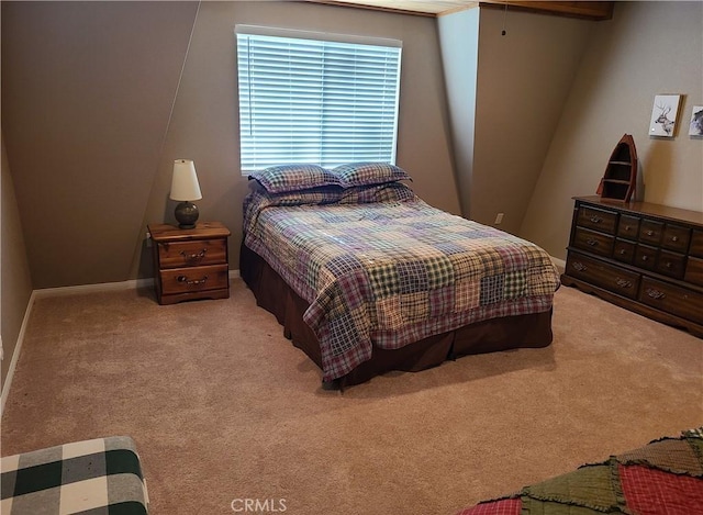 bedroom featuring light carpet