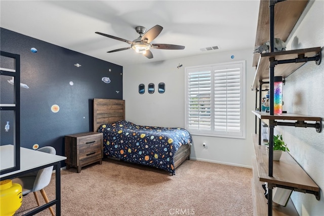 carpeted bedroom featuring ceiling fan