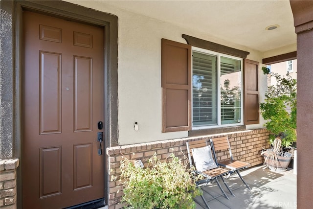 entrance to property with covered porch