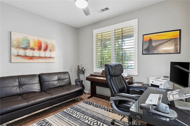 office area with ceiling fan, carpet, and plenty of natural light