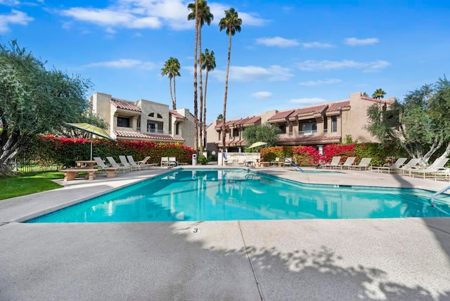 view of swimming pool featuring a patio