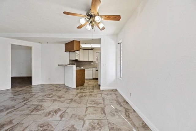 unfurnished living room featuring ceiling fan