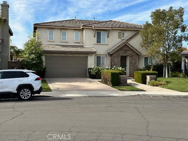 front of property featuring a garage