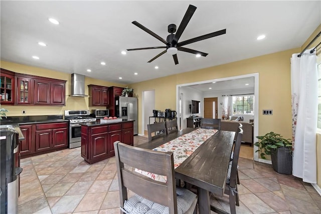 dining space featuring ceiling fan