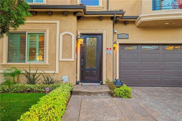 entrance to property featuring a garage