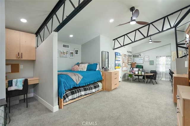 bedroom with ceiling fan and light carpet