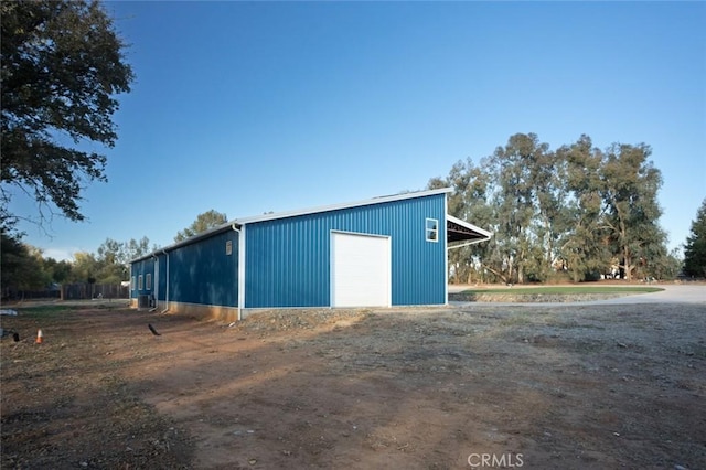 view of outdoor structure featuring a garage