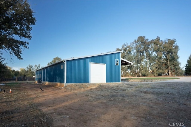 view of outdoor structure with a garage