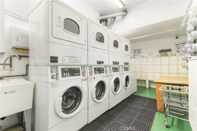 laundry area with separate washer and dryer and stacked washer / dryer