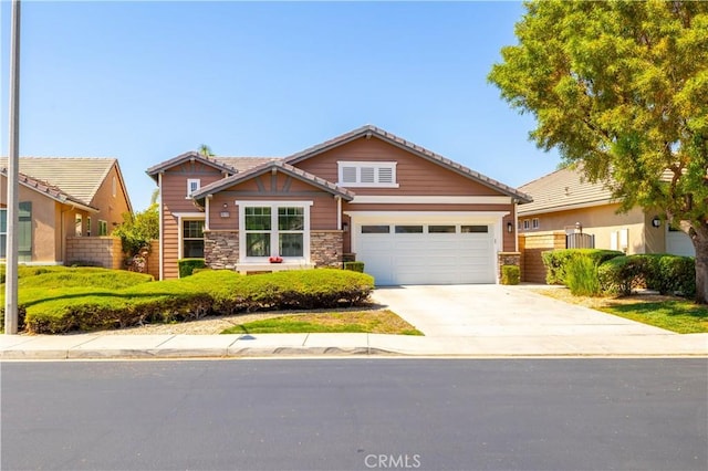 craftsman house with a garage