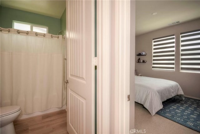 bedroom featuring light hardwood / wood-style floors