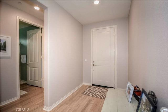 doorway to outside featuring light hardwood / wood-style flooring