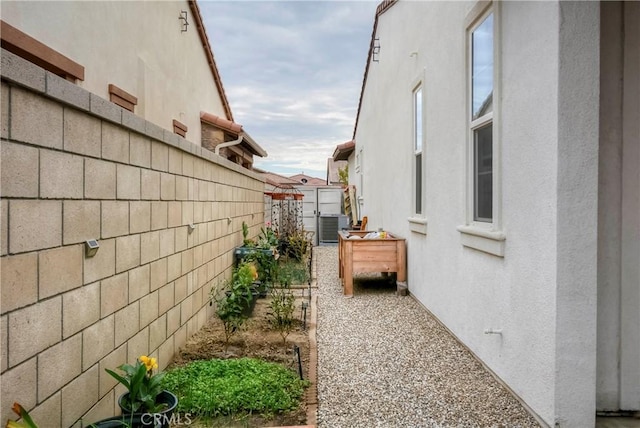 view of home's exterior featuring cooling unit