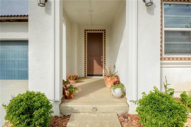 property entrance featuring a garage