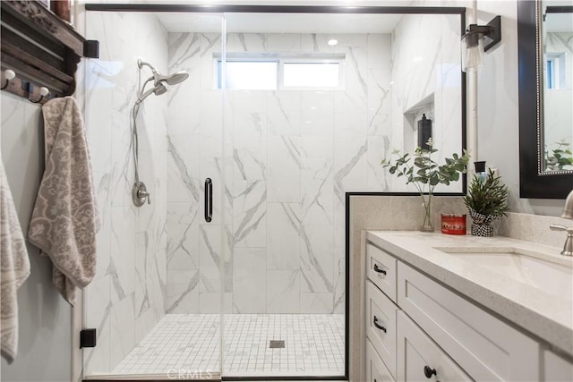 bathroom featuring vanity and walk in shower