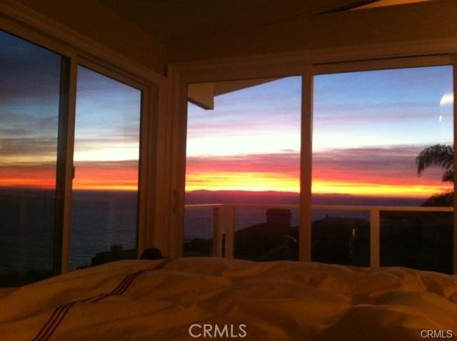 bedroom with a water view