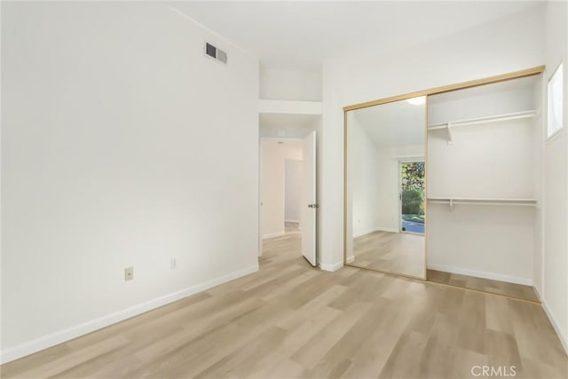 interior space featuring light hardwood / wood-style flooring and a closet