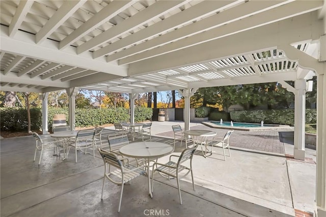 view of patio / terrace with a fenced in pool and a pergola