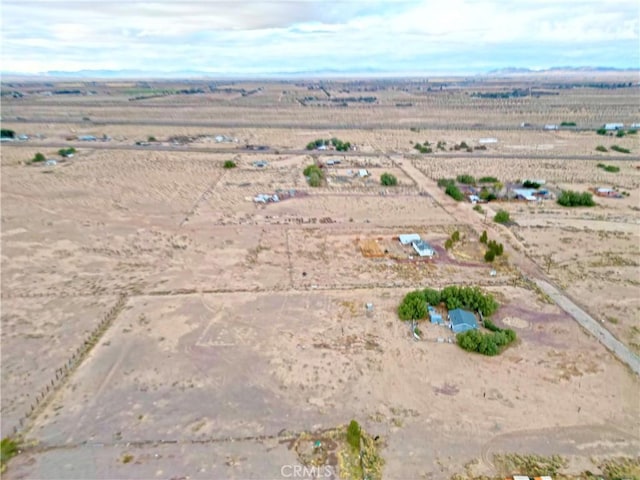 birds eye view of property featuring a rural view