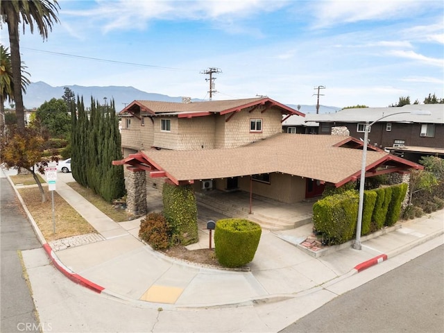 view of front of home with a mountain view