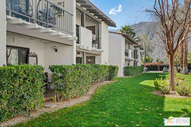 exterior space featuring a mountain view