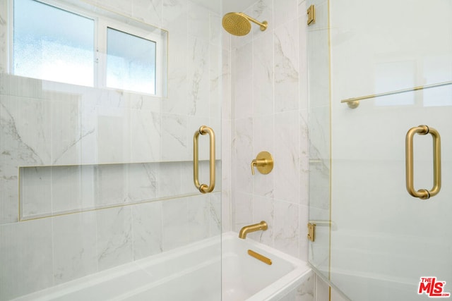 bathroom featuring enclosed tub / shower combo