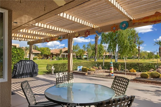 view of patio with a pergola and outdoor dining space