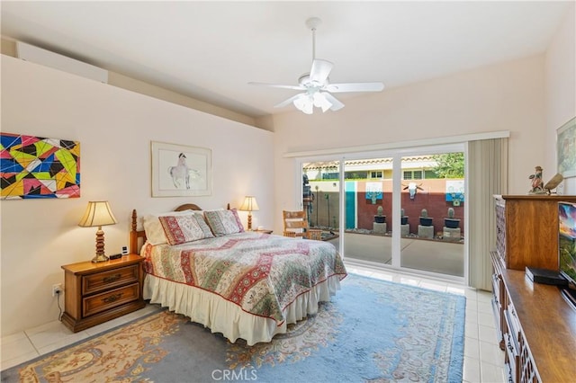 tiled bedroom with access to outside and ceiling fan