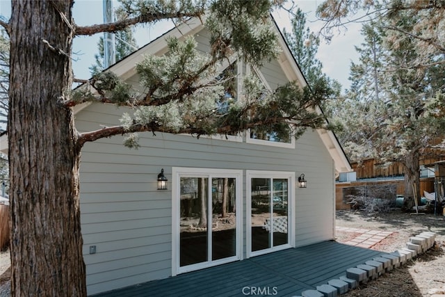 view of home's exterior featuring a deck