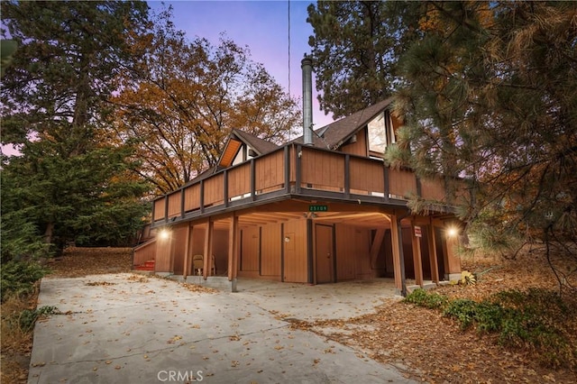 view of property exterior at dusk