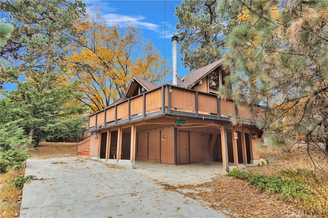 view of home's exterior with a deck