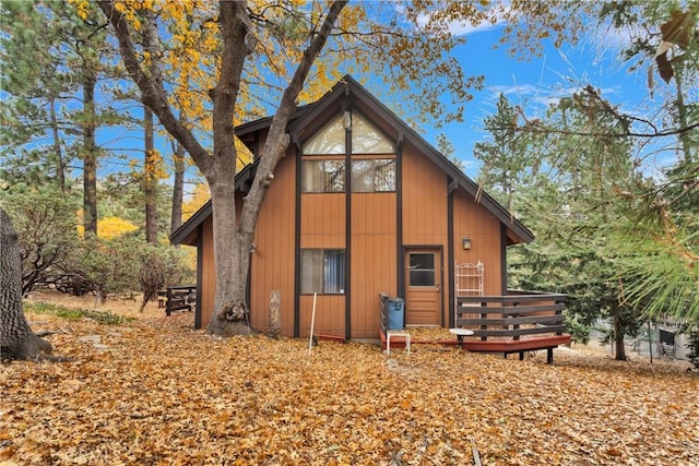 exterior space featuring a wooden deck