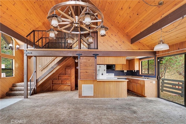 kitchen with wood ceiling, wood walls, stove, and light colored carpet