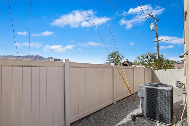 view of yard with central AC unit