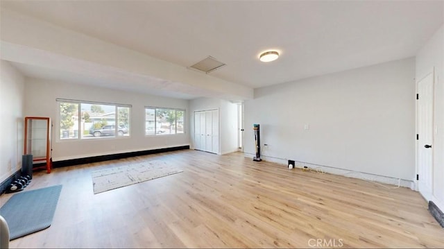 unfurnished room featuring light hardwood / wood-style flooring