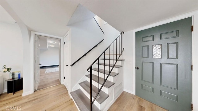 entryway with light hardwood / wood-style floors