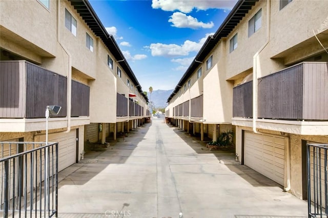 surrounding community featuring a mountain view