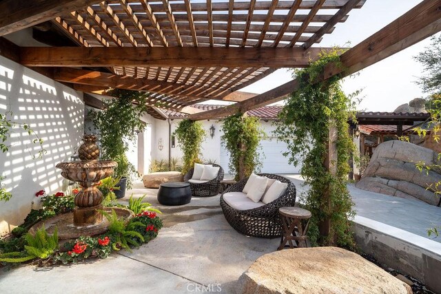 view of patio / terrace with an outdoor hangout area and a pergola