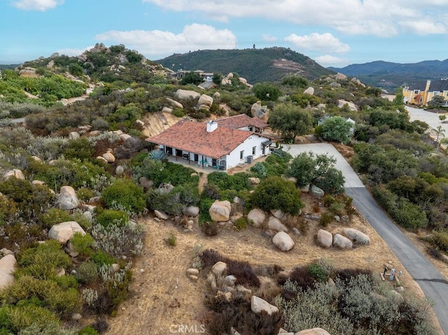 bird's eye view with a mountain view