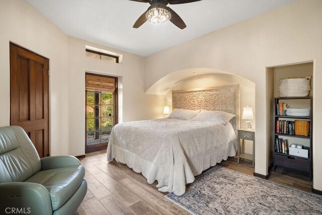 bedroom featuring ceiling fan and light hardwood / wood-style flooring