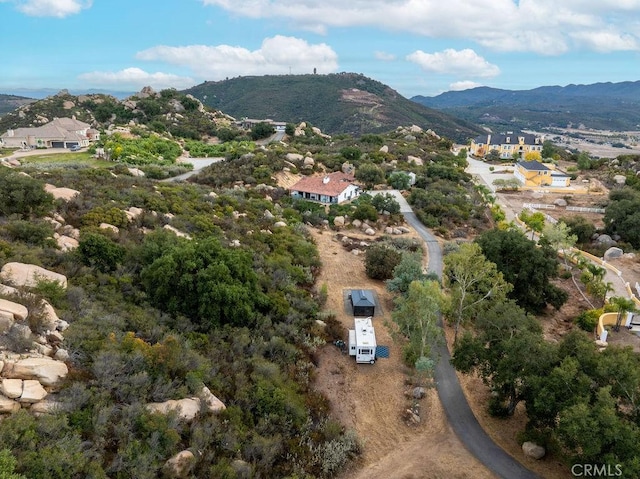 drone / aerial view featuring a mountain view