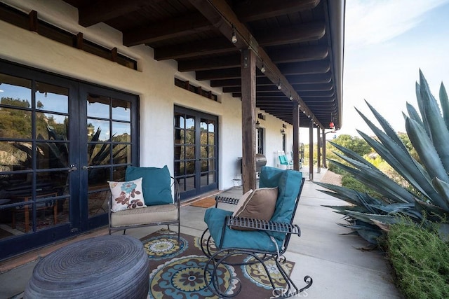 view of patio featuring french doors